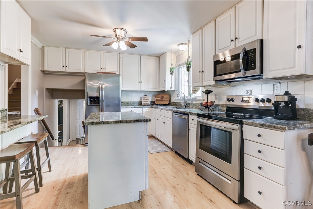 2005 Marroit Road Henrico, VA 23229 - Photo 10 of 40 White cabinets, gorgeous granite counters, and sti