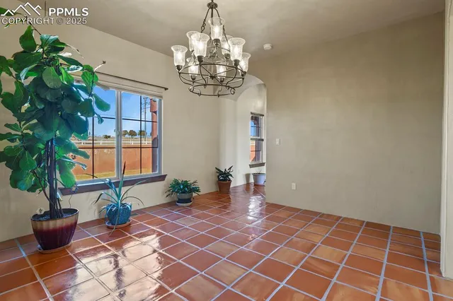 a vase of flowers sitting on a table