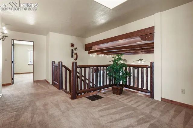 a view of a hallway with entryway