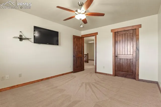 a view of a livingroom with a flat screen tv