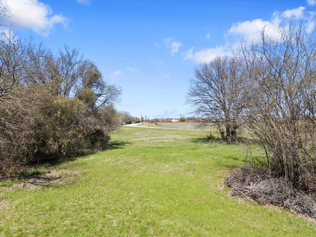6409 Chiesa Road Rowlett, TX 75089 - Photo 12 of 16 a view of an ocean from a yard