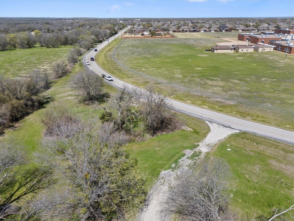 6409 Chiesa Road Rowlett, TX 75089 - Photo 14 of 16 a view of a lake with a mountain