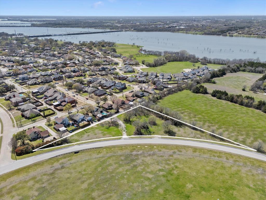 6409 Chiesa Road Rowlett, TX 75089 - Photo 2 of 16 a view of outdoor space and lake view