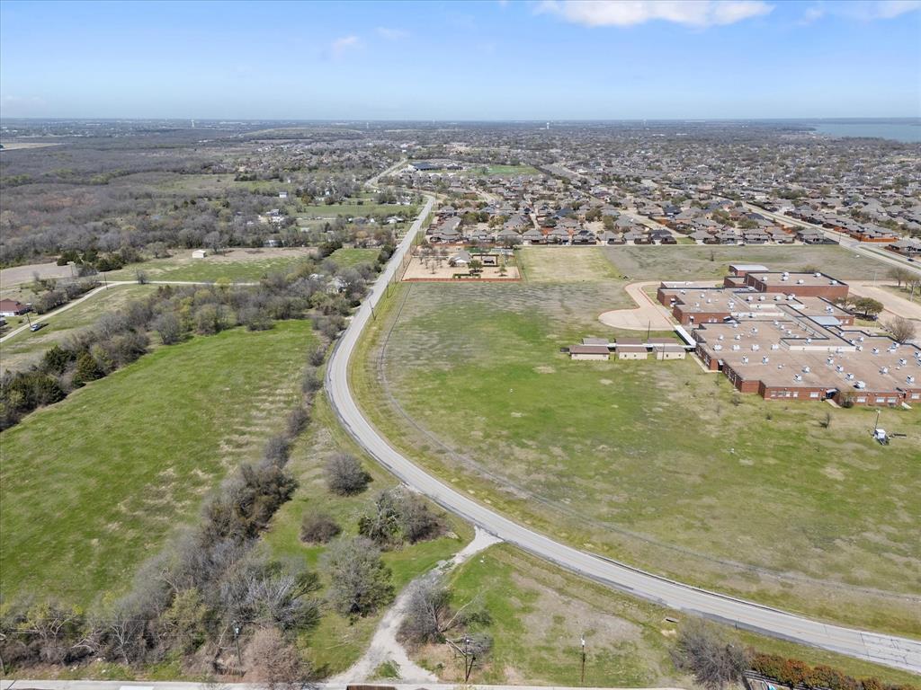 6409 Chiesa Road Rowlett, TX 75089 - Photo 4 of 16 an aerial view of residential houses with outdoor space