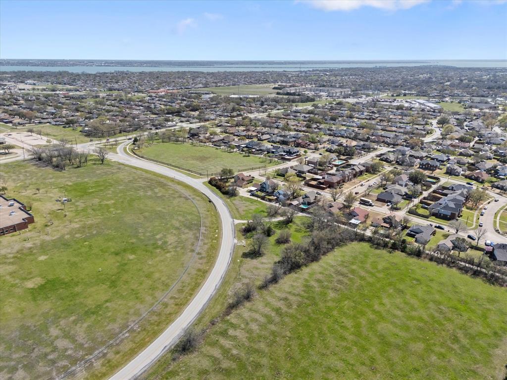 6409 Chiesa Road Rowlett, TX 75089 - Photo 6 of 16 an aerial view of residential houses with outdoor space