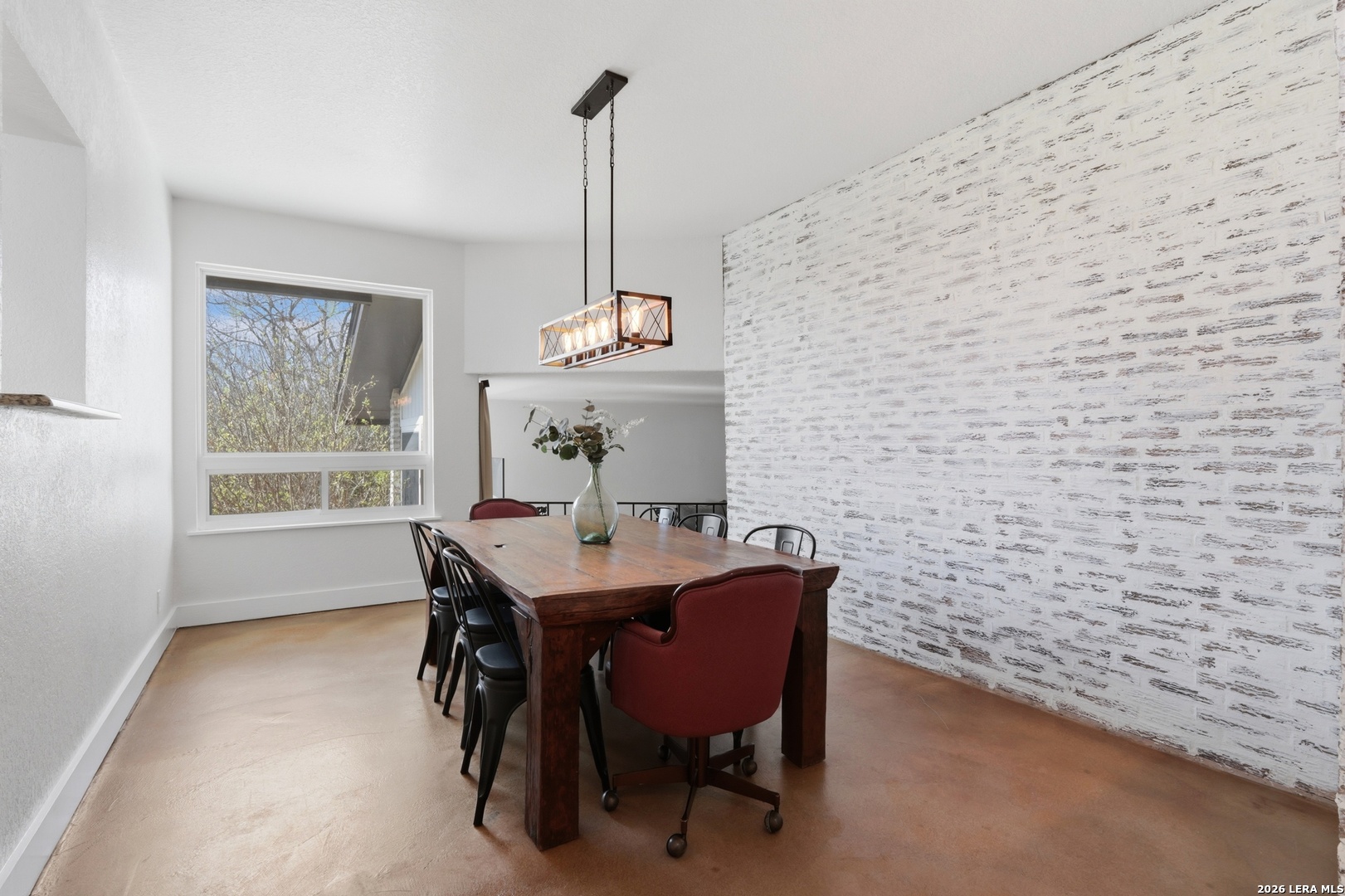 10206 Rafter S Trail Helotes, TX 78023 - Photo 12 of 49 a view of a dining room with furniture window and outside view