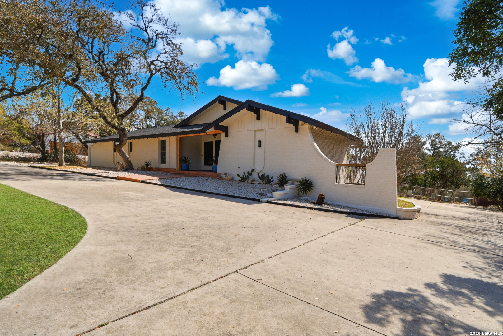10206 Rafter S Trail Helotes, TX 78023 - Photo 6 of 49 a view of a house with a yard