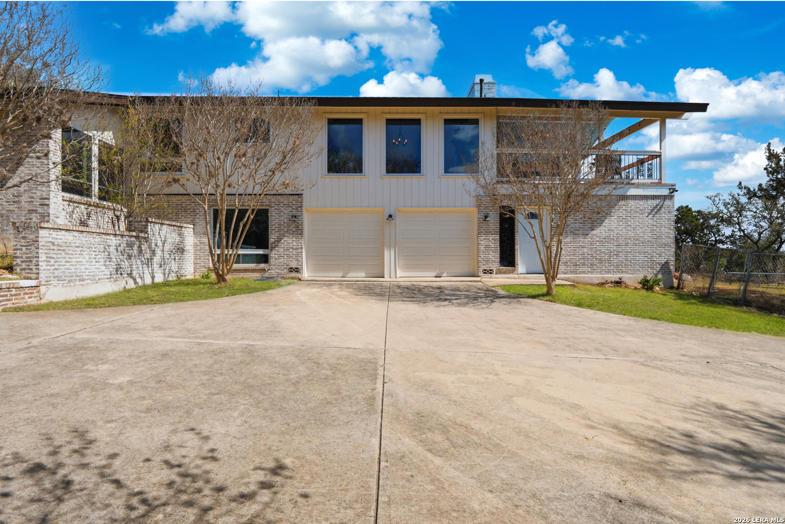 10206 Rafter S Trail Helotes, TX 78023 - Photo 7 of 49 a view of a house with basketball court
