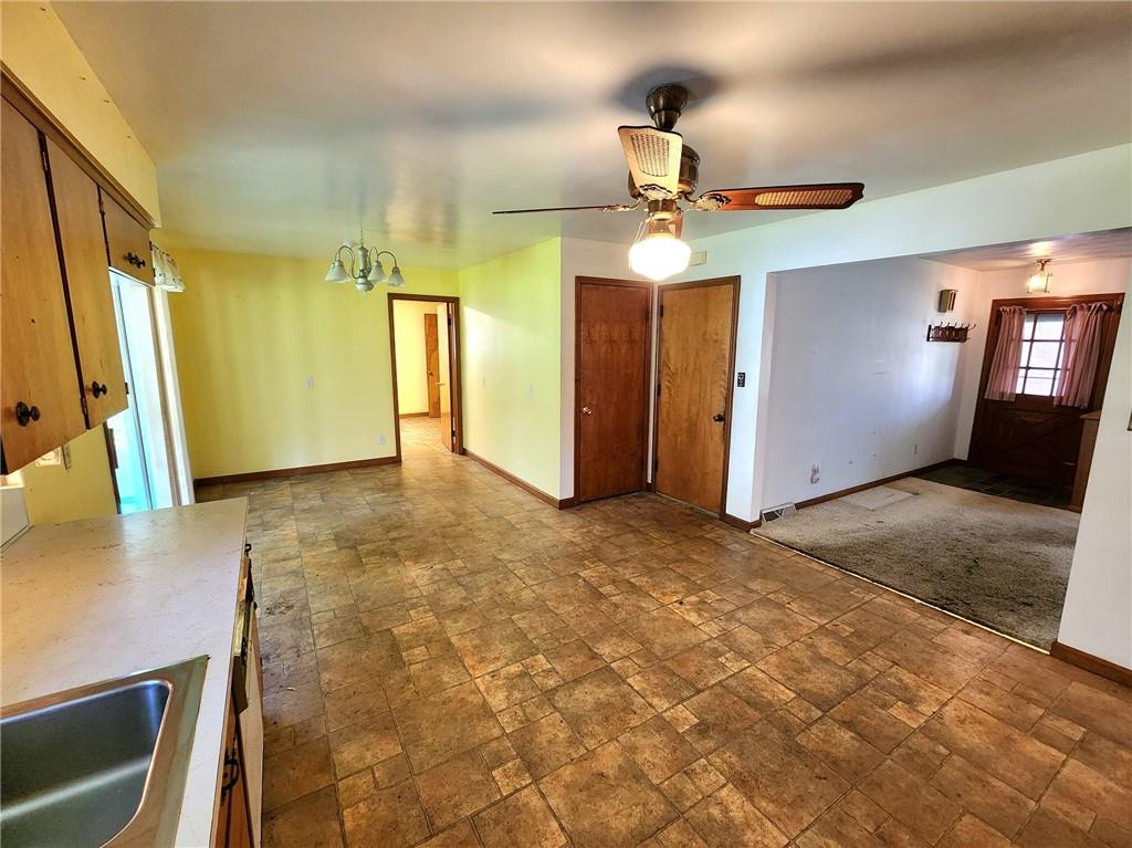 3060 Valley View Road Clark, PA 16113 - Photo 4 of 24 a view of a livingroom with a chandelier