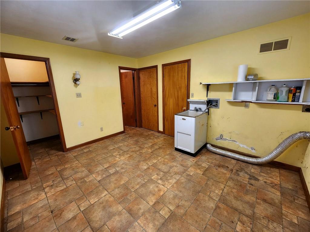 3060 Valley View Road Clark, PA 16113 - Photo 8 of 24 a room with storage and utility