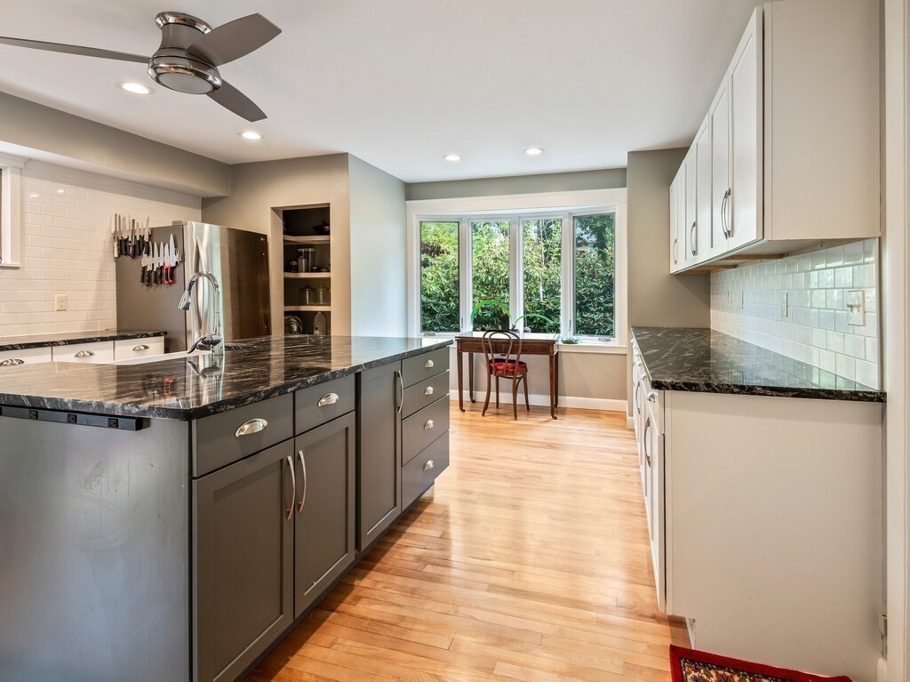 8 Montvale Road Worcester, MA 01609 - Photo 12 of 31 a large kitchen with granite countertop a large counter top appliances and cabinets