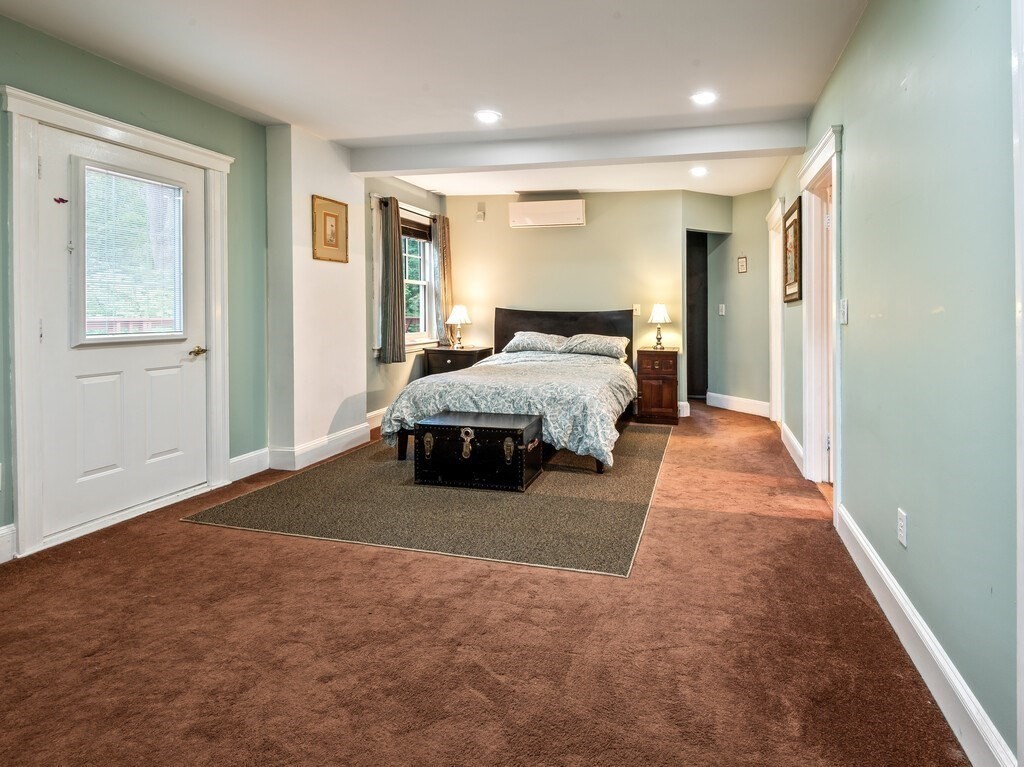 8 Montvale Road Worcester, MA 01609 - Photo 18 of 31 a bed room with a bed and a window