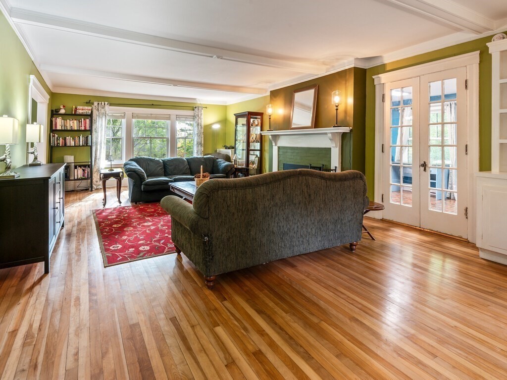 8 Montvale Road Worcester, MA 01609 - Photo 10 of 31 a living room with furniture and a fireplace