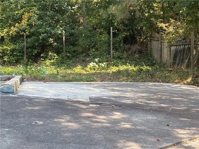 a view of backyard with green space