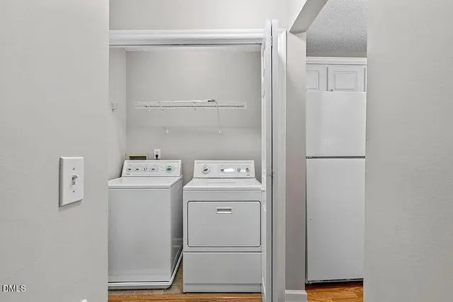a utility room with dryer and washer