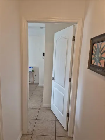 a view of a bathroom from a hallway