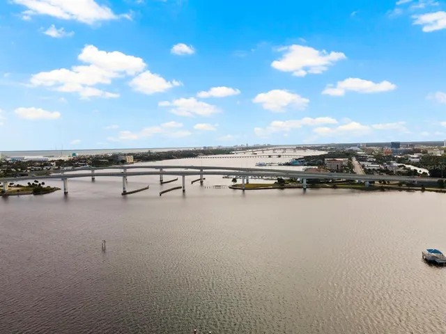 a view of an ocean and sunset