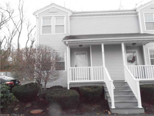 15 Woodhill Road, Unit 15 Milford, CT 06461 - Photo 1 of 1 a view of a house with a yard