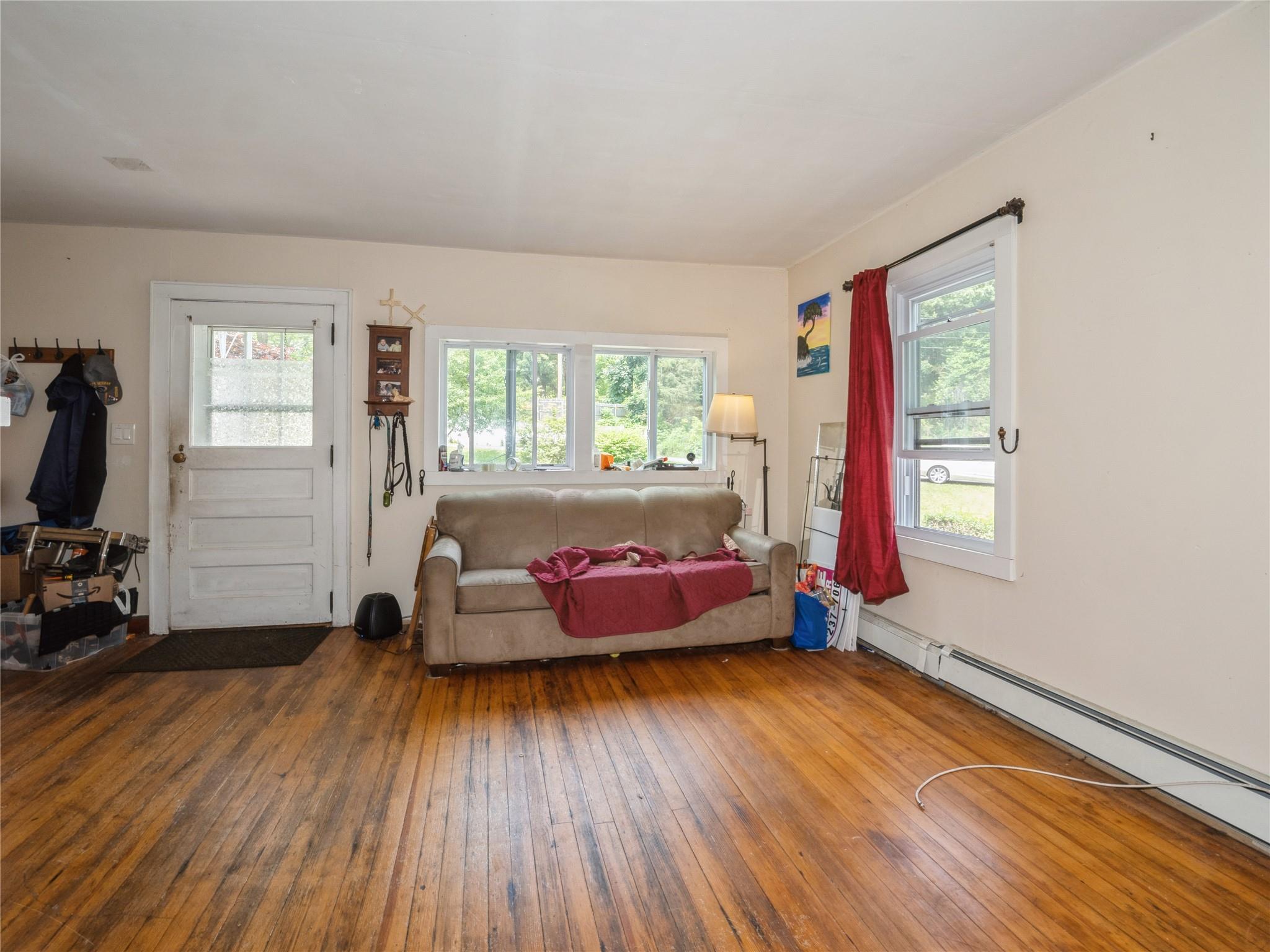 413 Vassar Road Poughkeepsie, NY 12603 - Photo 10 of 38 a bedroom with furniture and a window