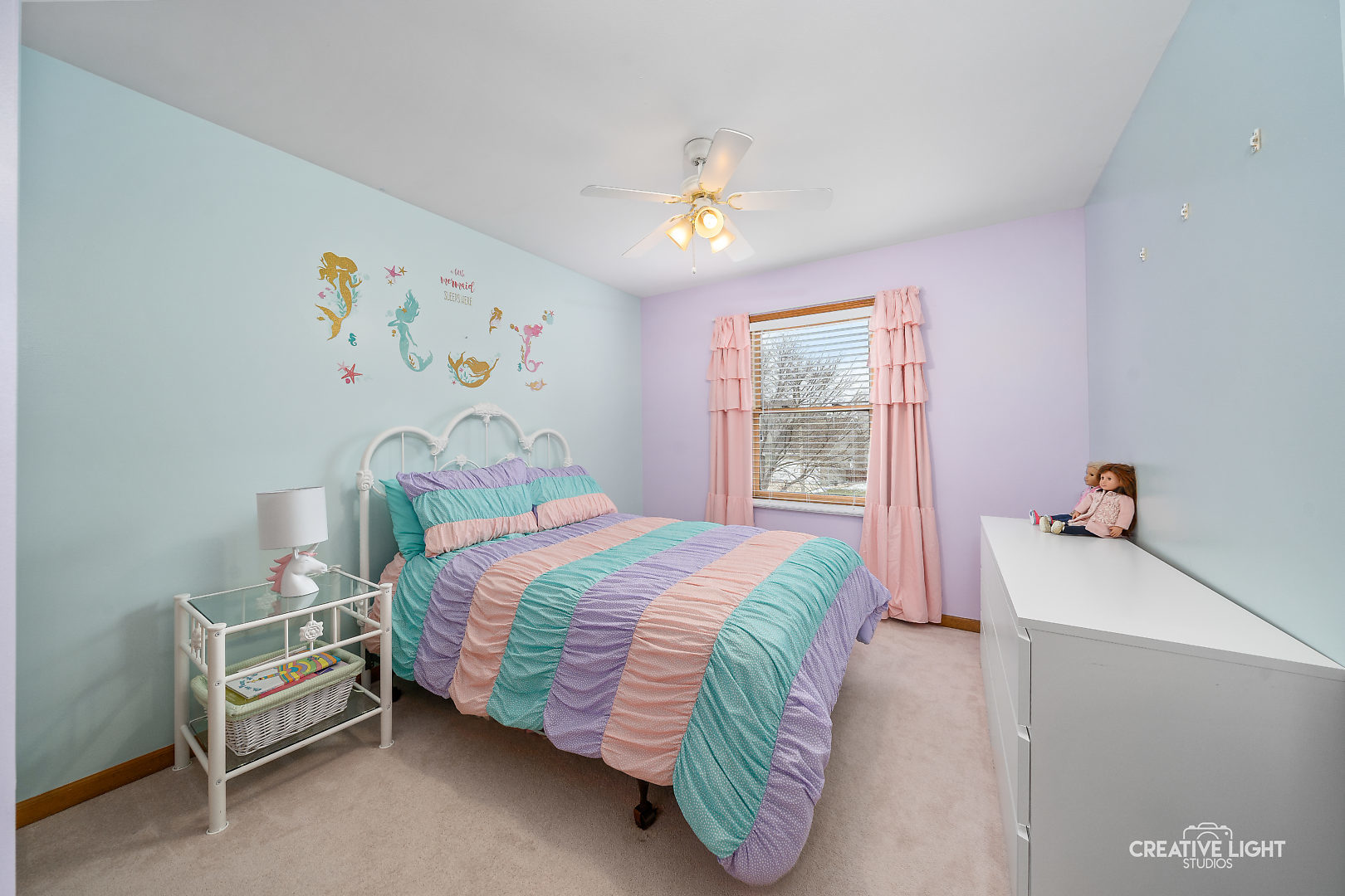 1714 Chestnut Hill Road Plainfield, IL 60586 - Photo 14 of 29 a bedroom with a bed and a chandelier