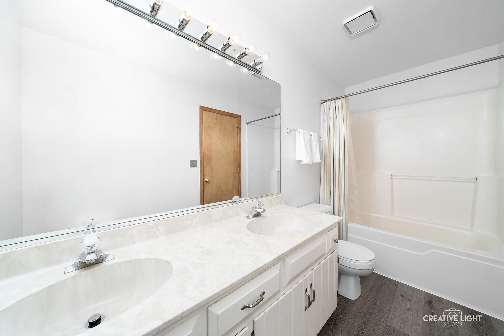 1714 Chestnut Hill Road Plainfield, IL 60586 - Photo 17 of 29 a bathroom with a double vanity sink toilet and shower