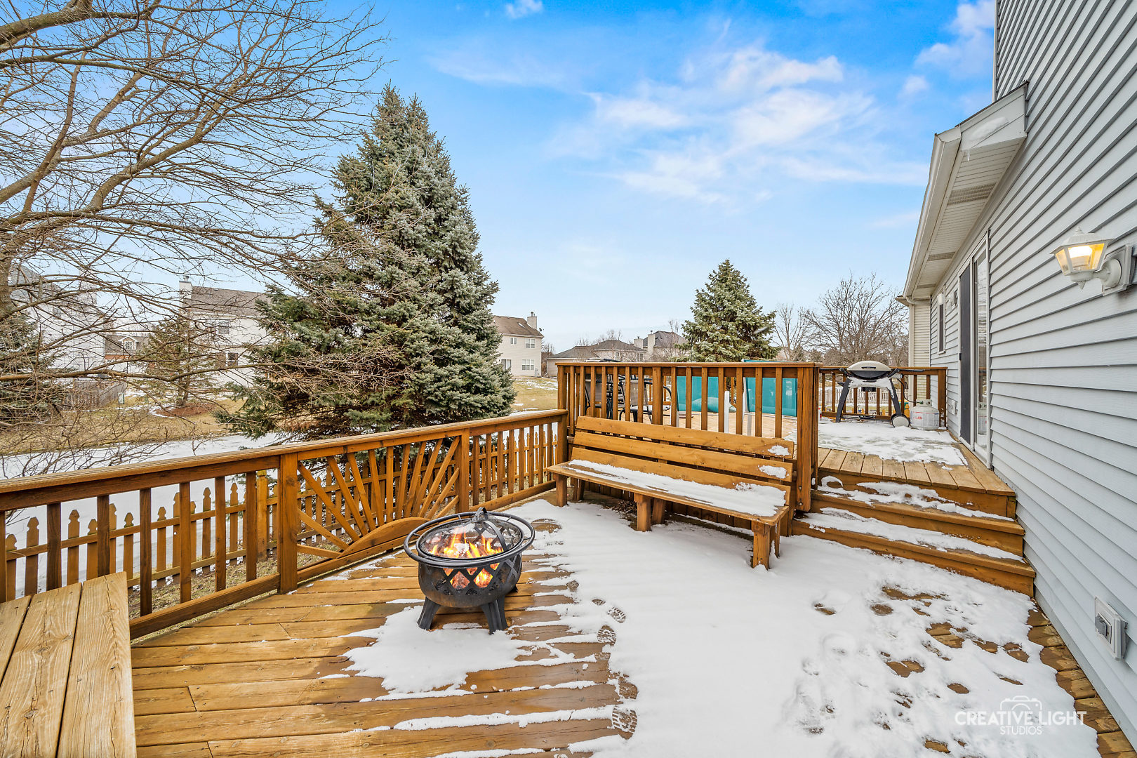 1714 Chestnut Hill Road Plainfield, IL 60586 - Photo 29 of 29 a view of a roof deck with wooden floor and fence
