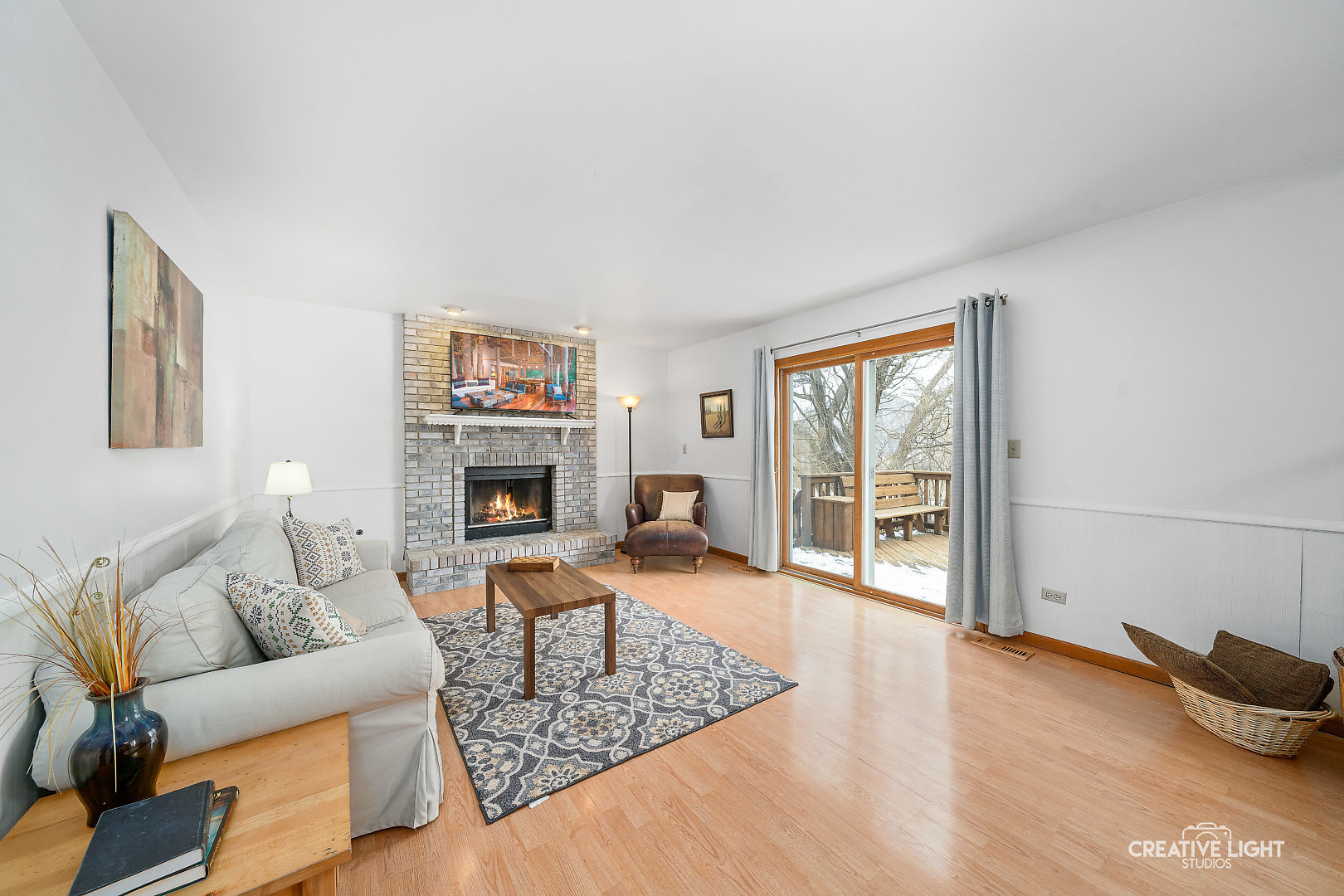 1714 Chestnut Hill Road Plainfield, IL 60586 - Photo 5 of 29 a living room with furniture and a fireplace