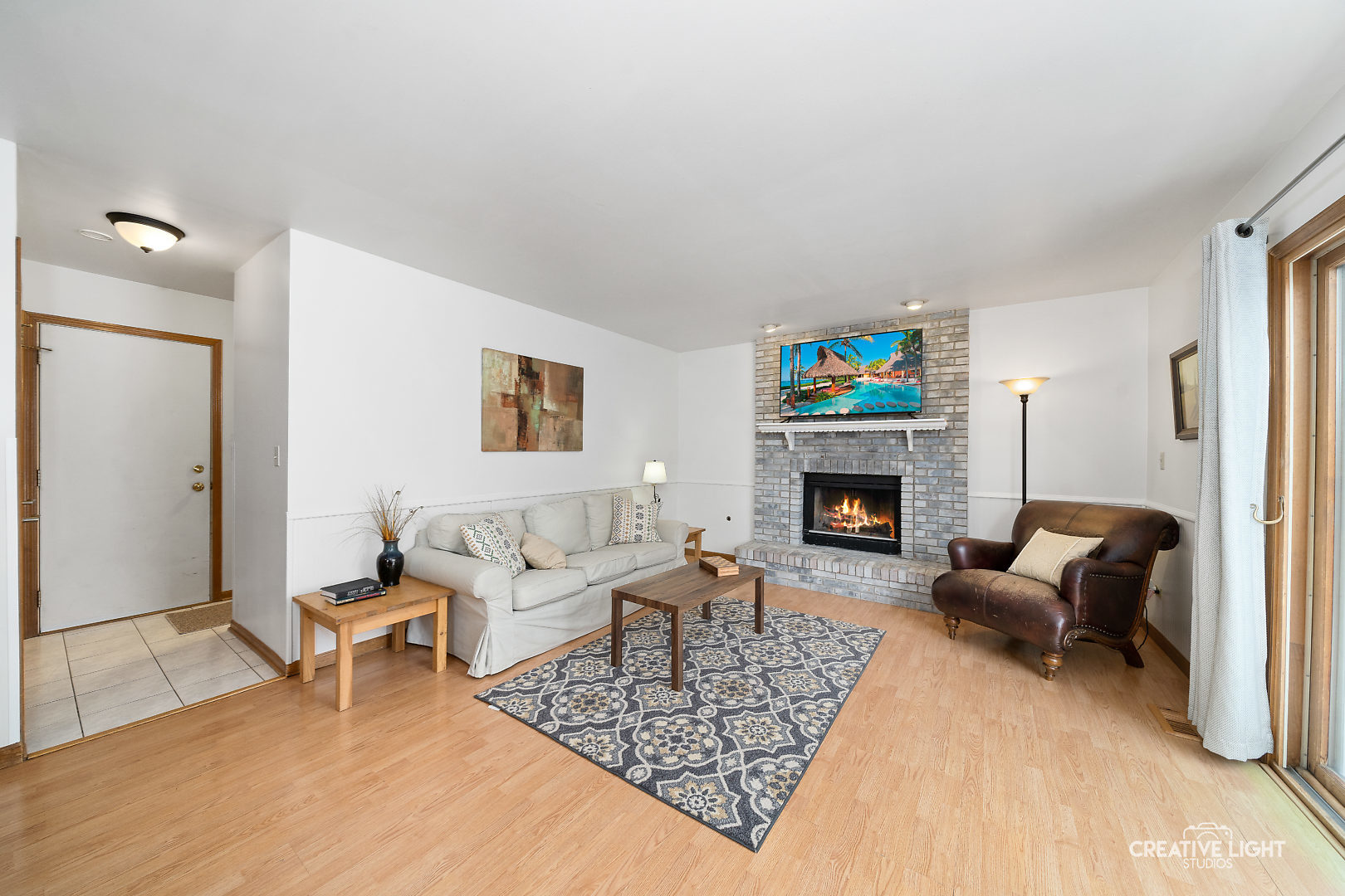 1714 Chestnut Hill Road Plainfield, IL 60586 - Photo 6 of 29 a living room with furniture and a fireplace