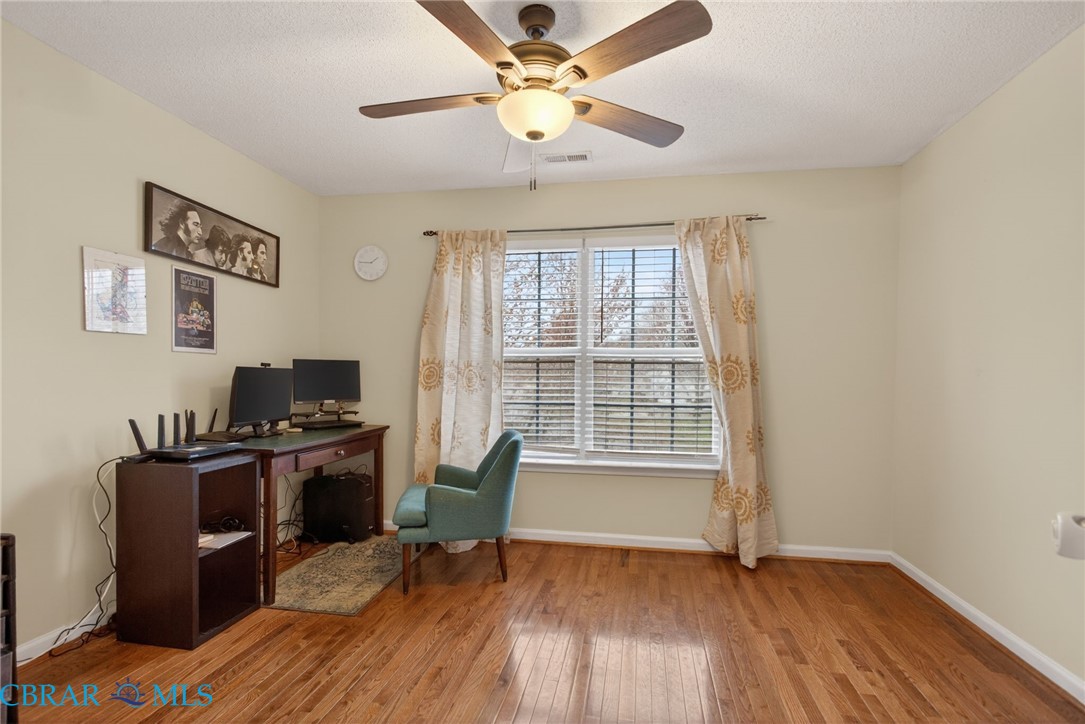 116 Old Field Road Williamsburg, VA 23188 - Photo 24 of 27 Office area featuring light wood-type flooring, ceiling fan, and a textured ceiling