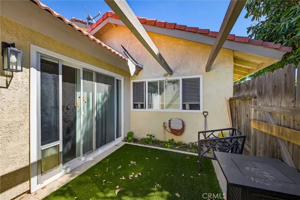 a house view with a backyard space