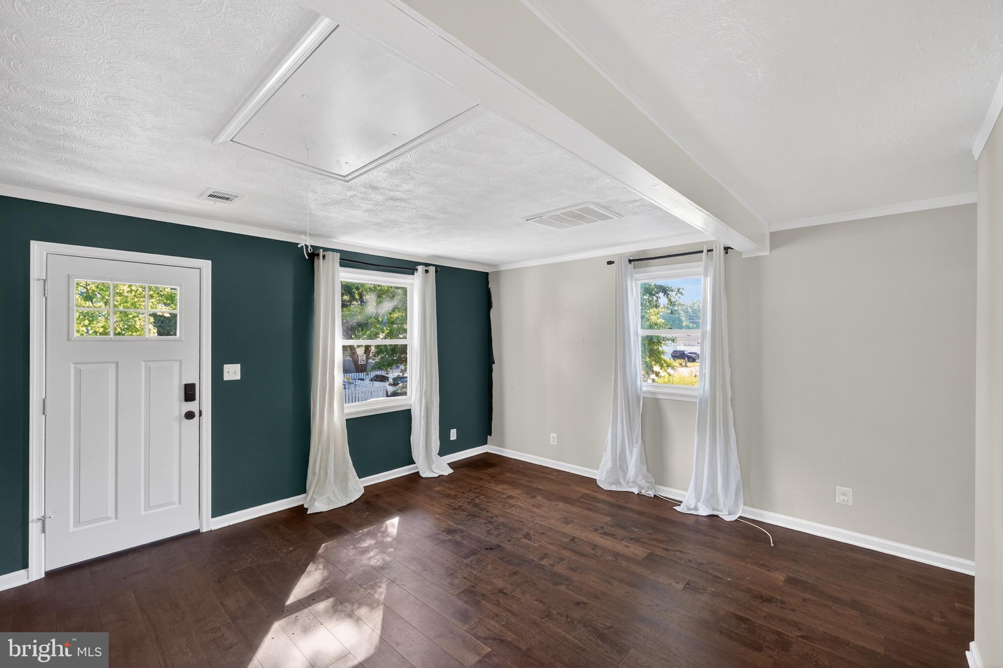 3670 5th Avenue Edgewater, MD 21037 - Photo 7 of 60 an empty room with window and wooden floor