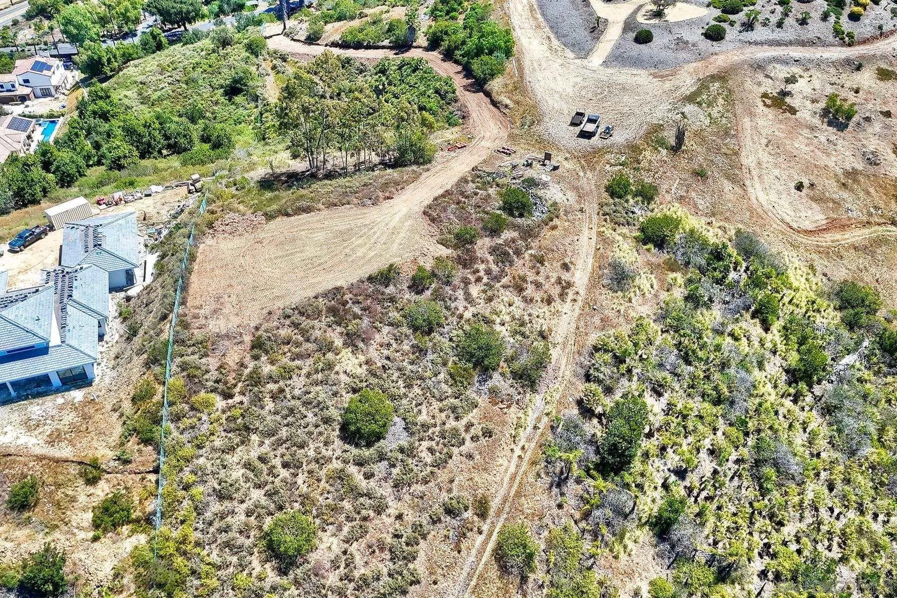 0 Buena Creek Road, Unit 39 Vista, CA 92084 - Photo 3 of 18 a view of a garden with a plant