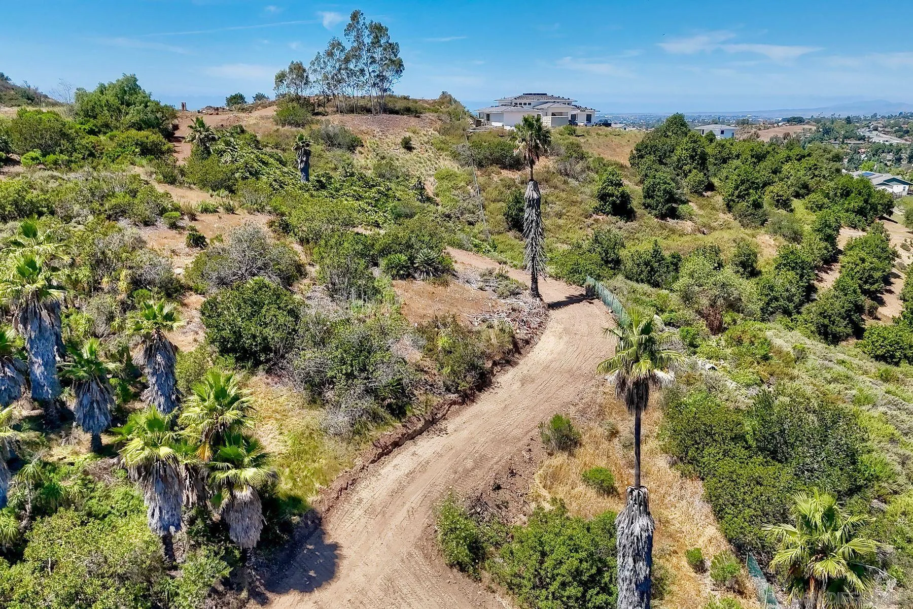 0 Buena Creek Road, Unit 39 Vista, CA 92084 - Photo 7 of 18 a view of a bunch of trees and houses