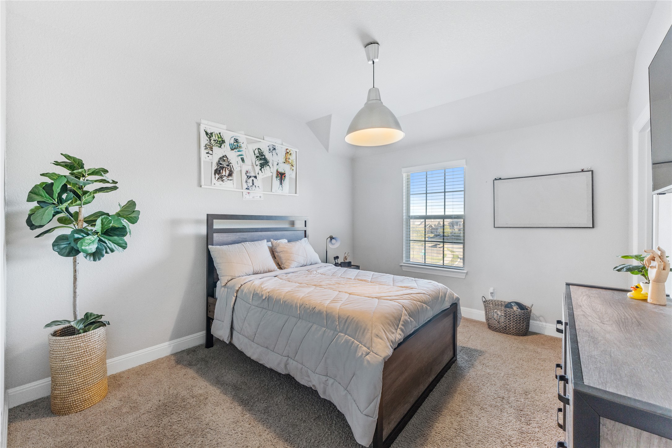20524 Fairleaf Street Pflugerville, TX 78660 - Photo 22 of 35 Bedroom featuring baseboards and light carpet