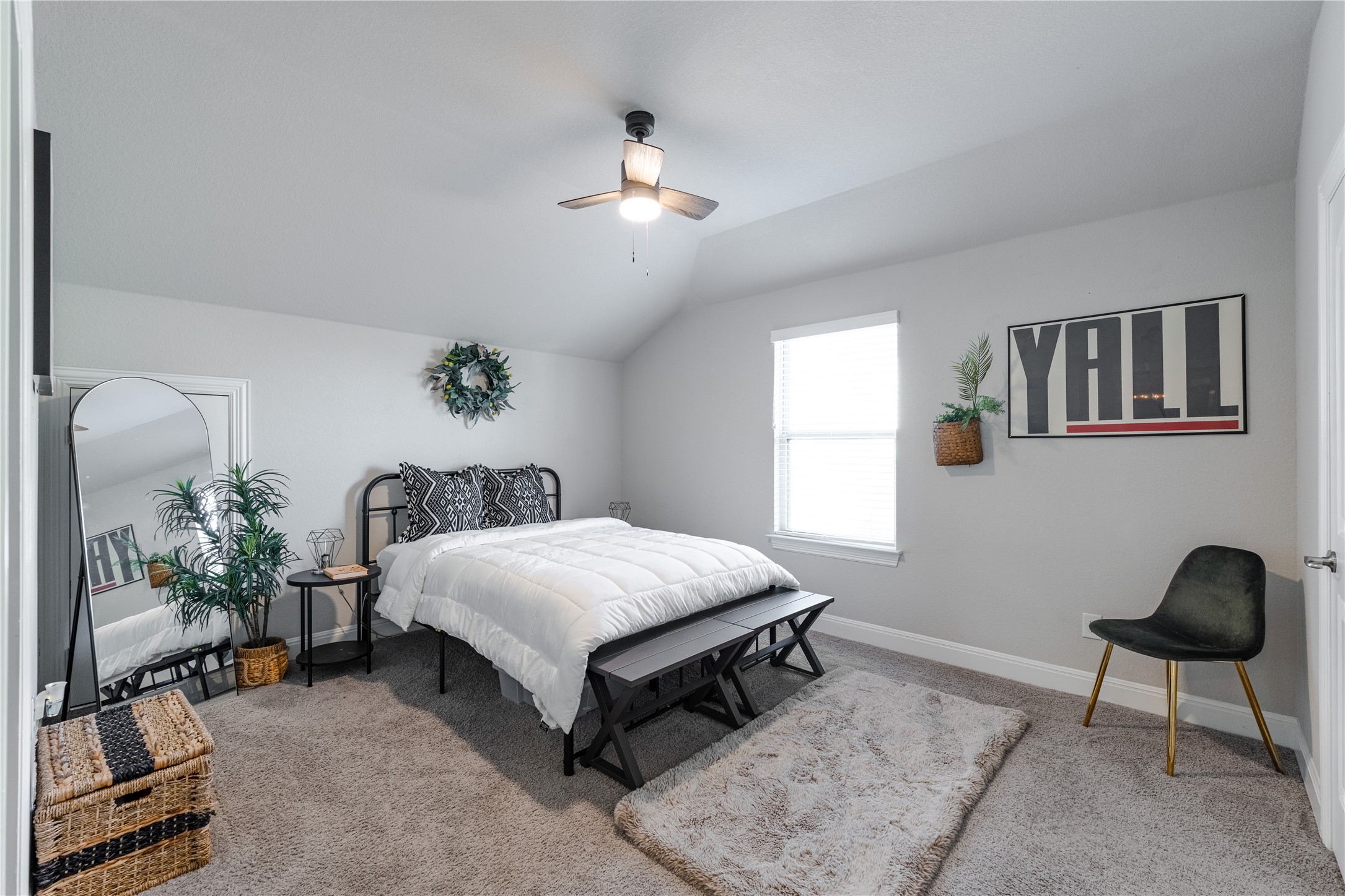 20524 Fairleaf Street Pflugerville, TX 78660 - Photo 24 of 35 Bedroom featuring carpet floors, a ceiling fan, and vaulted ceiling