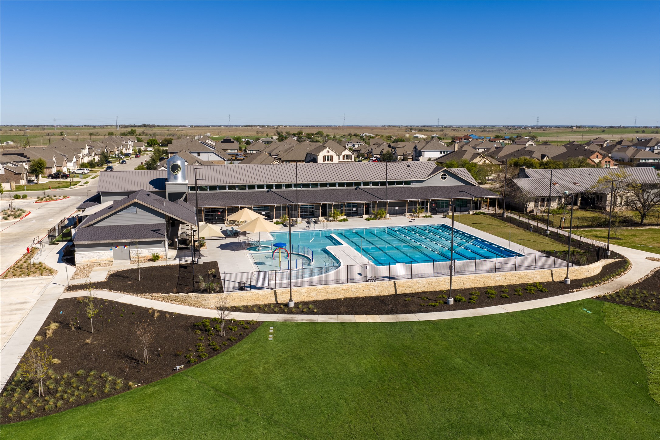 20524 Fairleaf Street Pflugerville, TX 78660 - Photo 34 of 35 Community pool with a residential view and a patio area