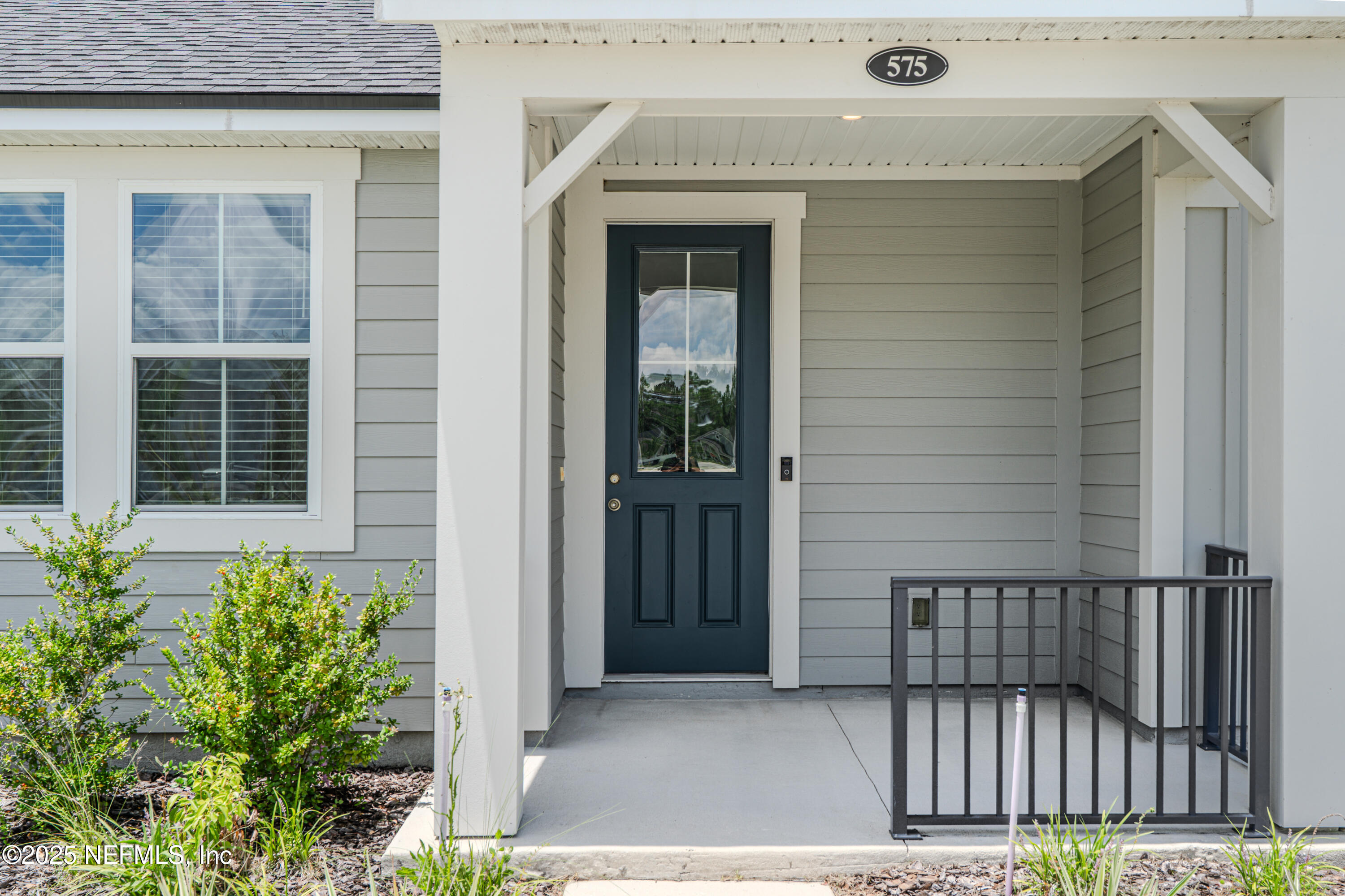 575 Buttonwood Loop Yulee, FL 32097 - Photo 4 of 72 Front Porch With Room For Seating
