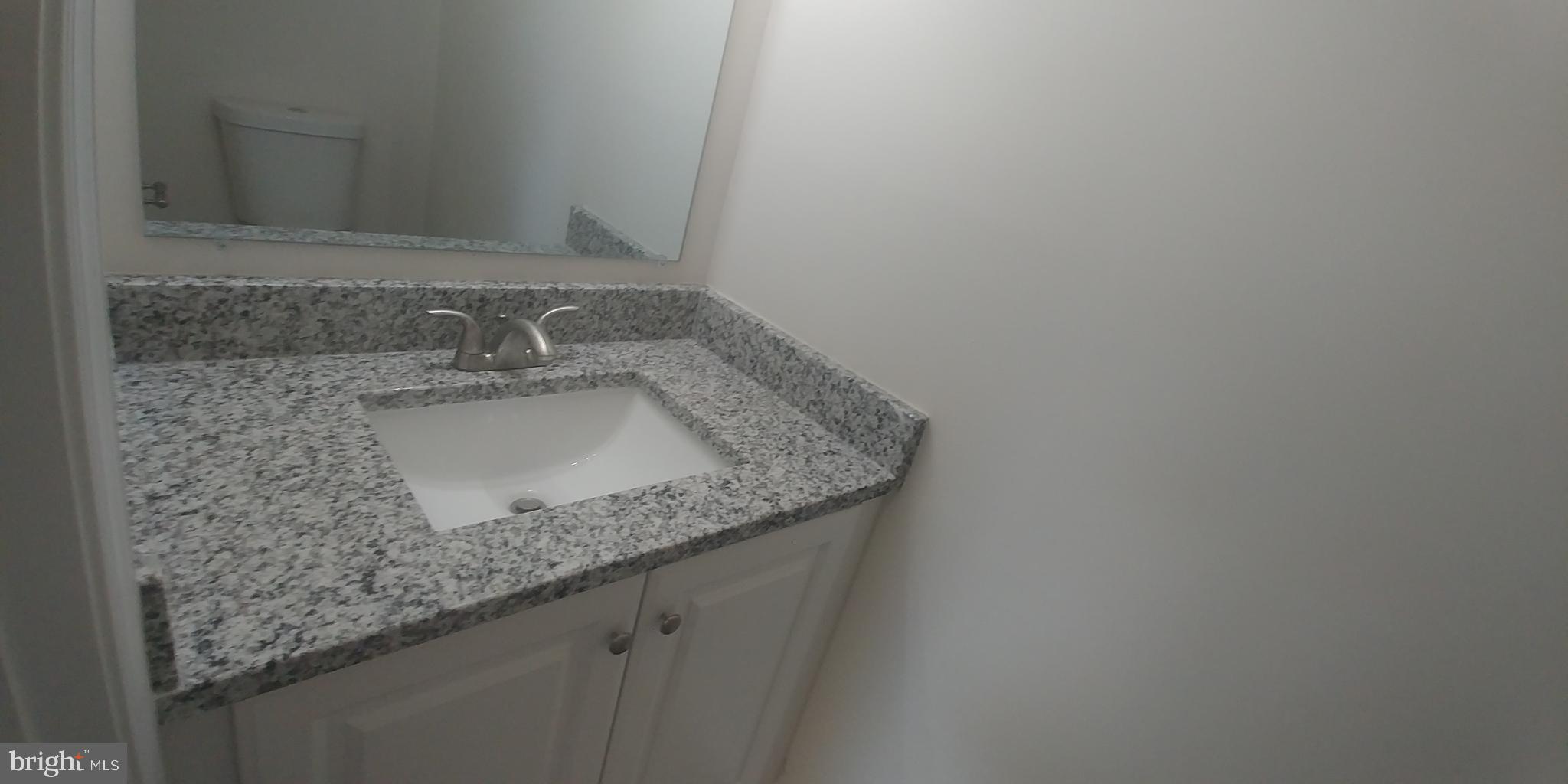7404 Greeley Road Hyattsville, MD 20785 - Photo 11 of 23 Powder room on main level