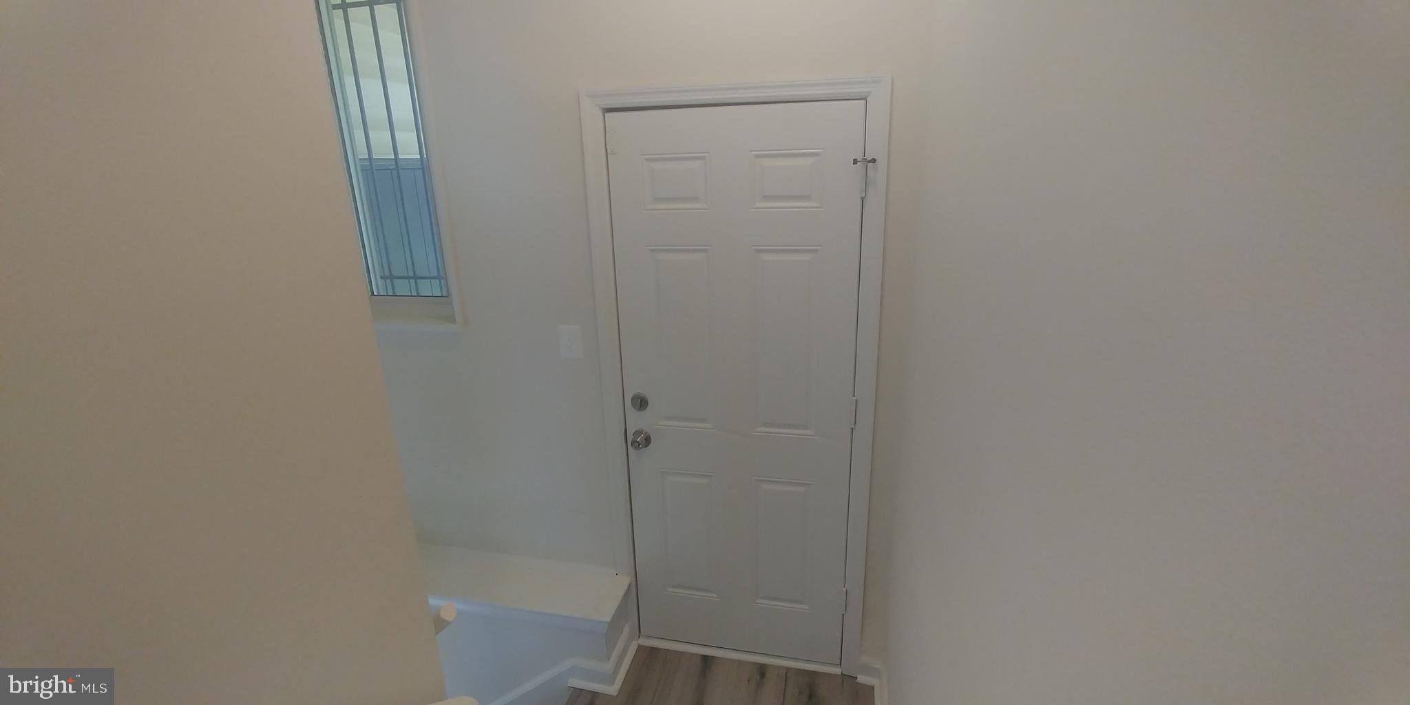 7404 Greeley Road Hyattsville, MD 20785 - Photo 21 of 23 door to back yard off of the stairs