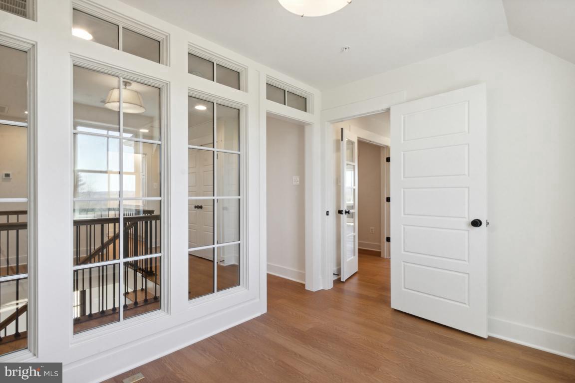 3110 Thurston Road Frederick, MD 21704 - Photo 25 of 38 Loft / sitting room w tempered glass panels.