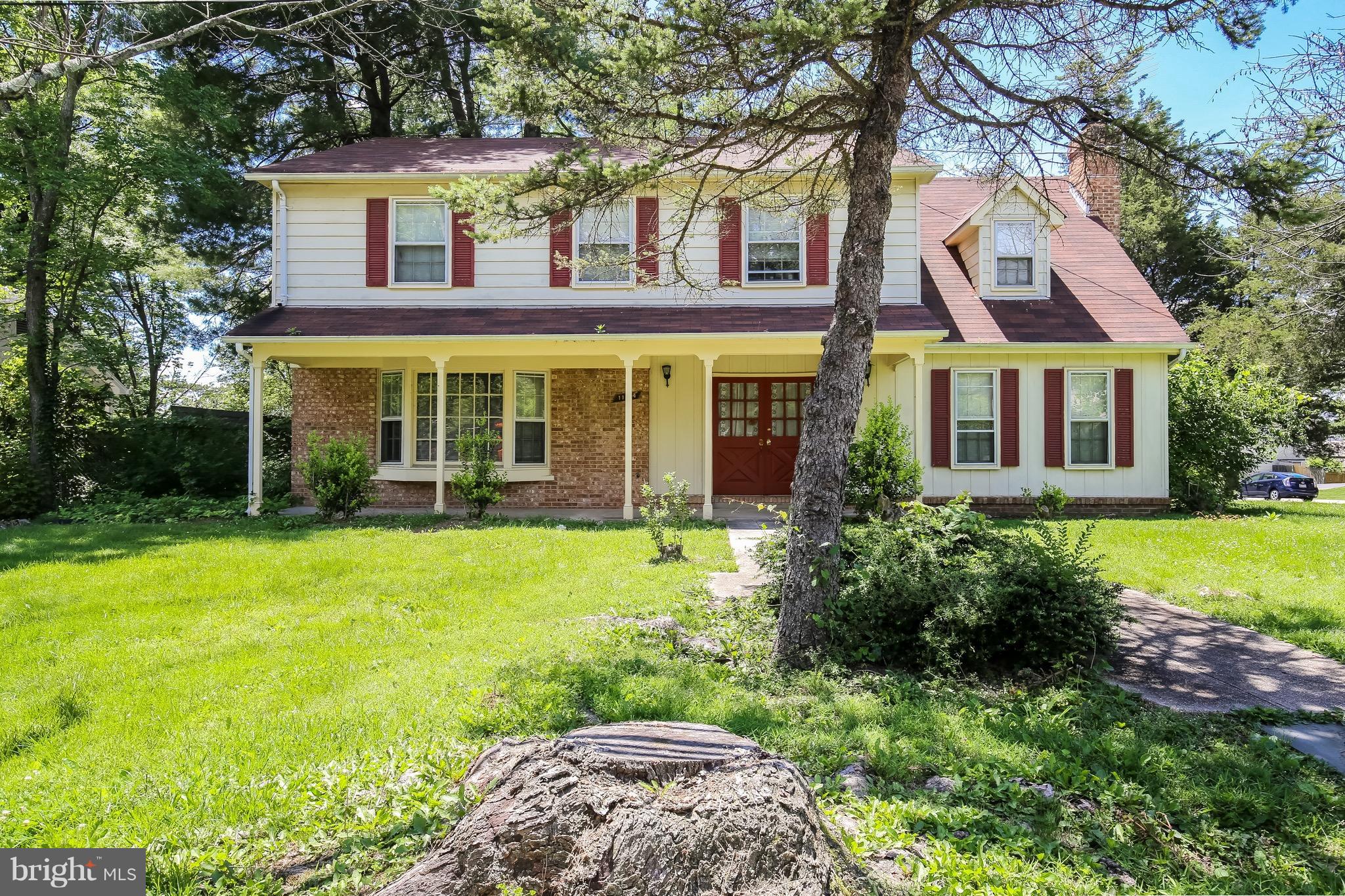11514 Seven Locks Road Rockville, MD 20854 - Photo 1 of 10 front view of a house with a yard