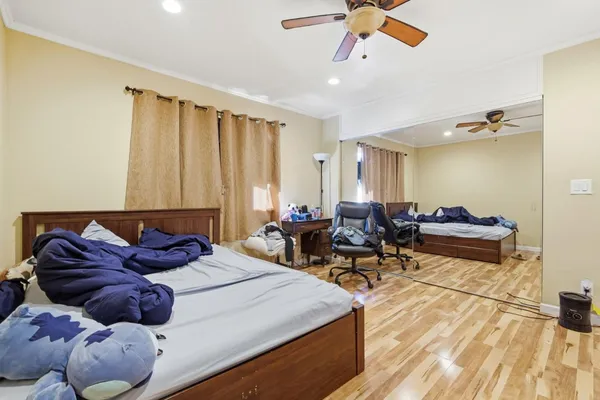 a bed room with a bed and a couch