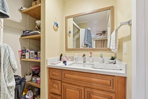 a bathroom with a sink and a mirror