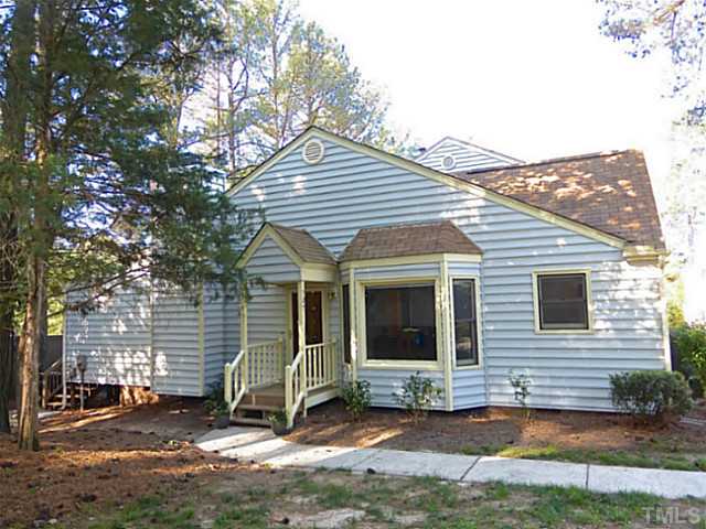 737 Benchmark Drive Raleigh, NC 27615 - Photo 1 of 14 a view of a house with a yard