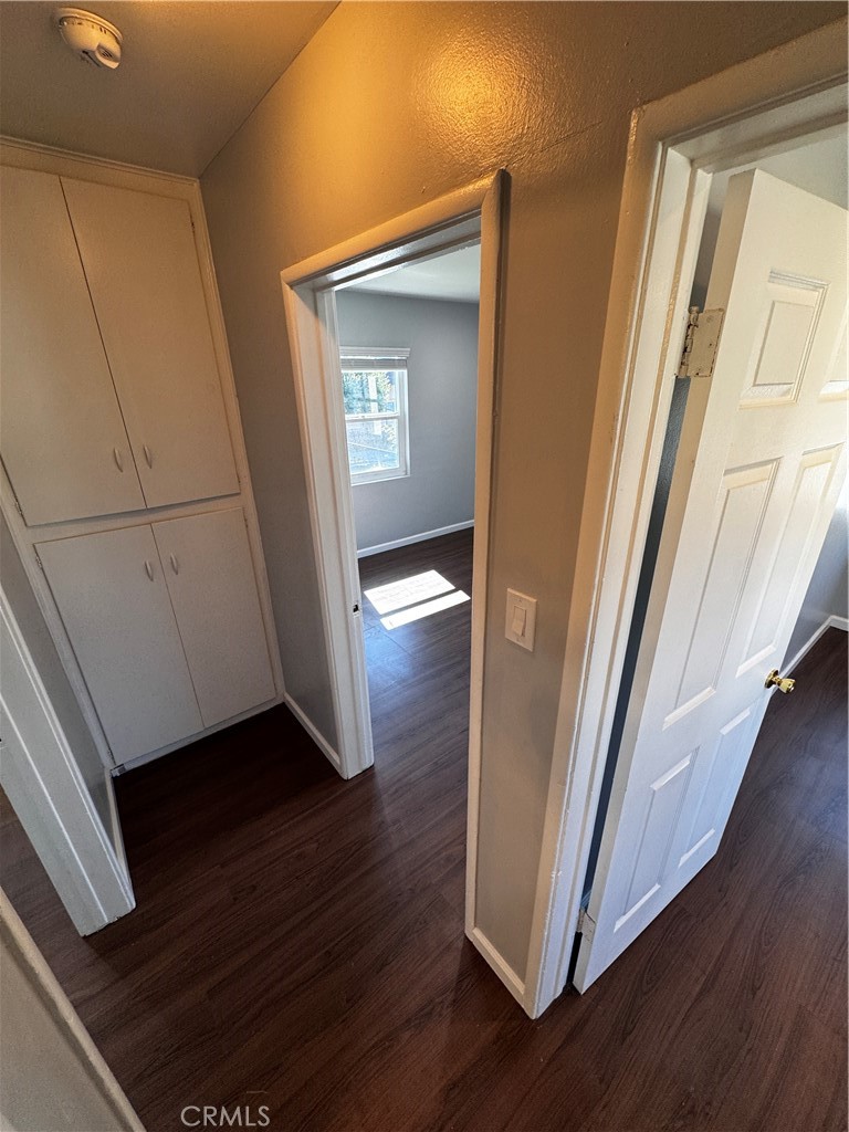 1357 Orange Grove Avenue, Unit A Glendale, CA 91205 - Photo 13 of 17 a view of a hallway with wooden floor and stairs