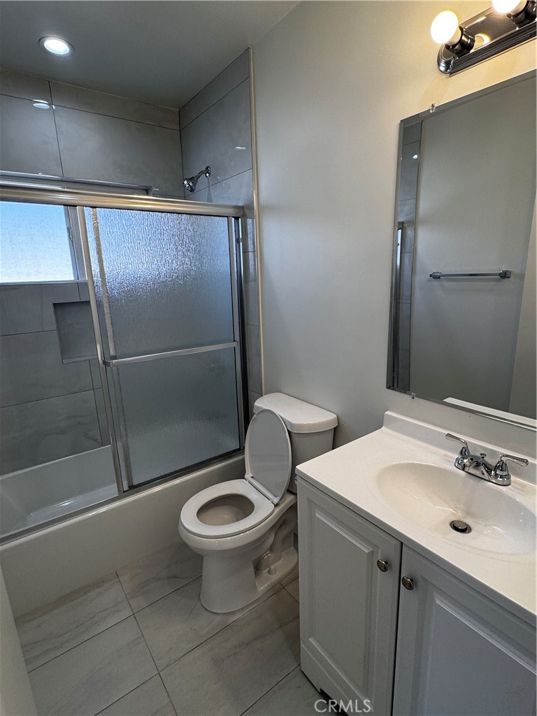 1357 Orange Grove Avenue, Unit A Glendale, CA 91205 - Photo 6 of 17 a bathroom with a sink toilet and shower
