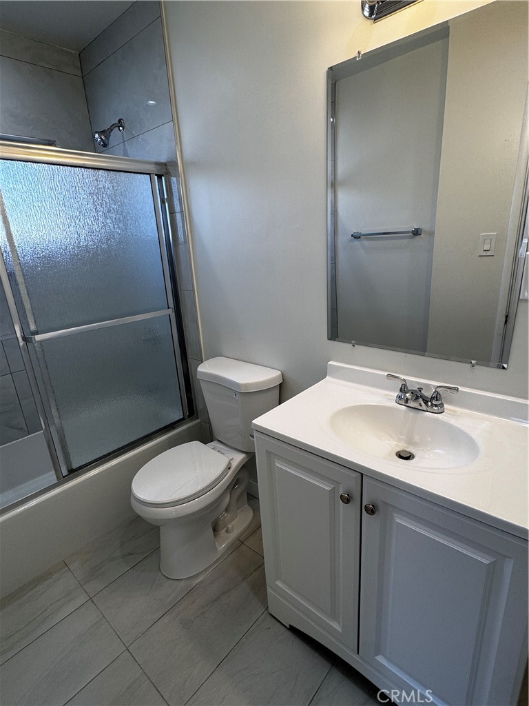 1357 Orange Grove Avenue, Unit A Glendale, CA 91205 - Photo 7 of 17 a bathroom with a toilet sink and shower