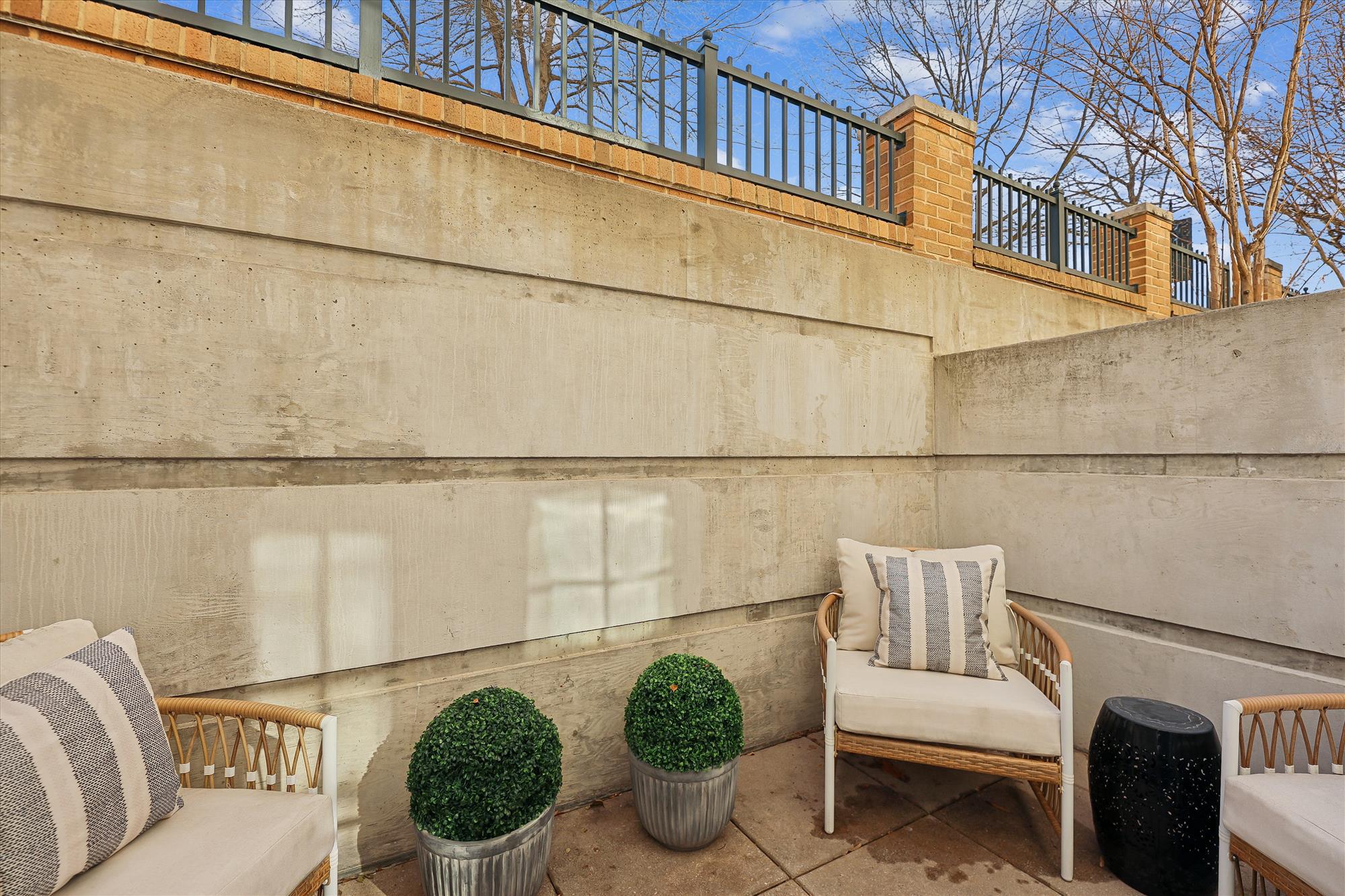2501 Wisconsin Avenue Northwest, Unit 7 Washington, DC 20007 - Photo 14 of 28 a balcony with table and chairs