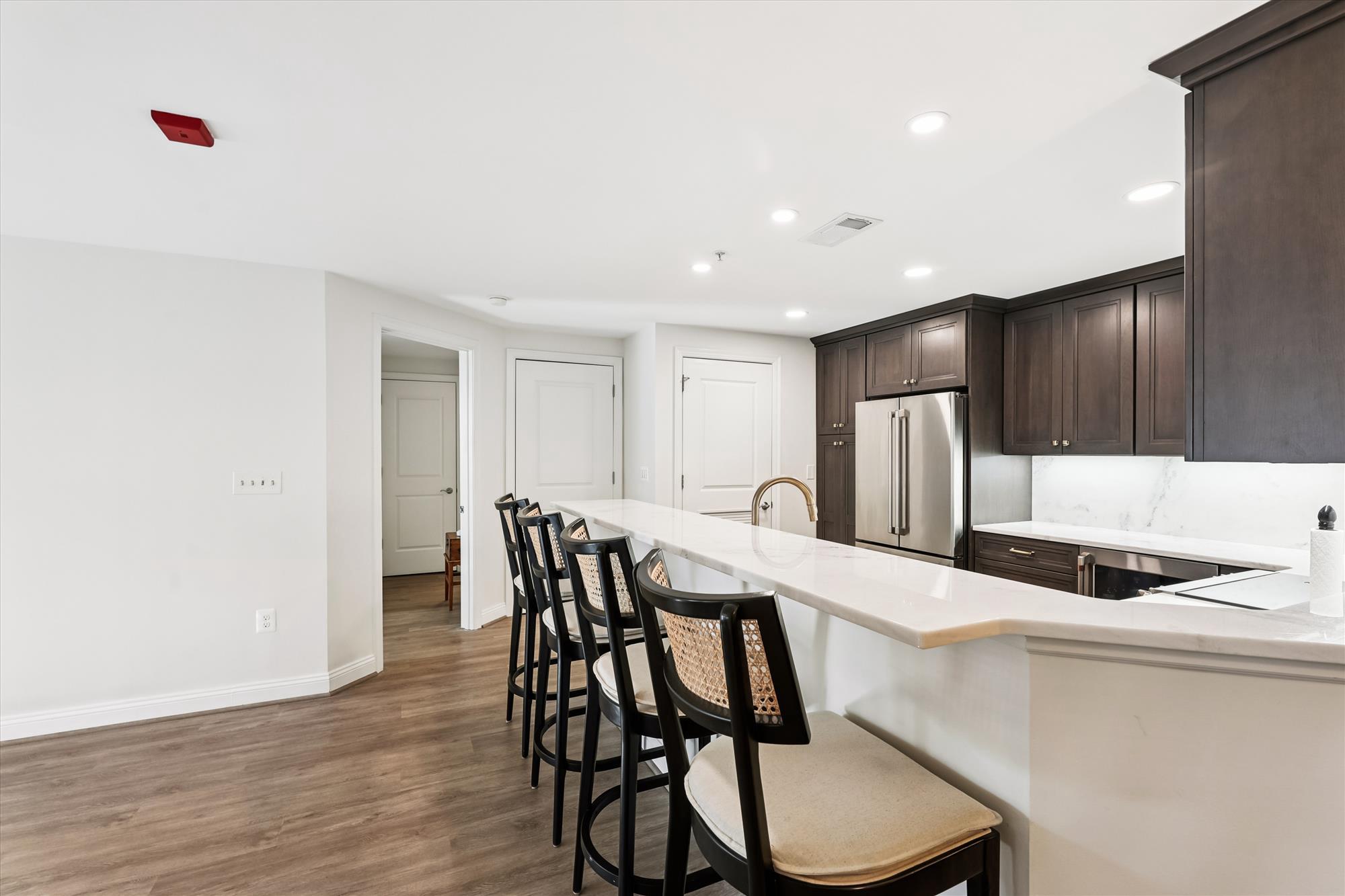 2501 Wisconsin Avenue Northwest, Unit 7 Washington, DC 20007 - Photo 20 of 30 Breakfast bar with marble countertops