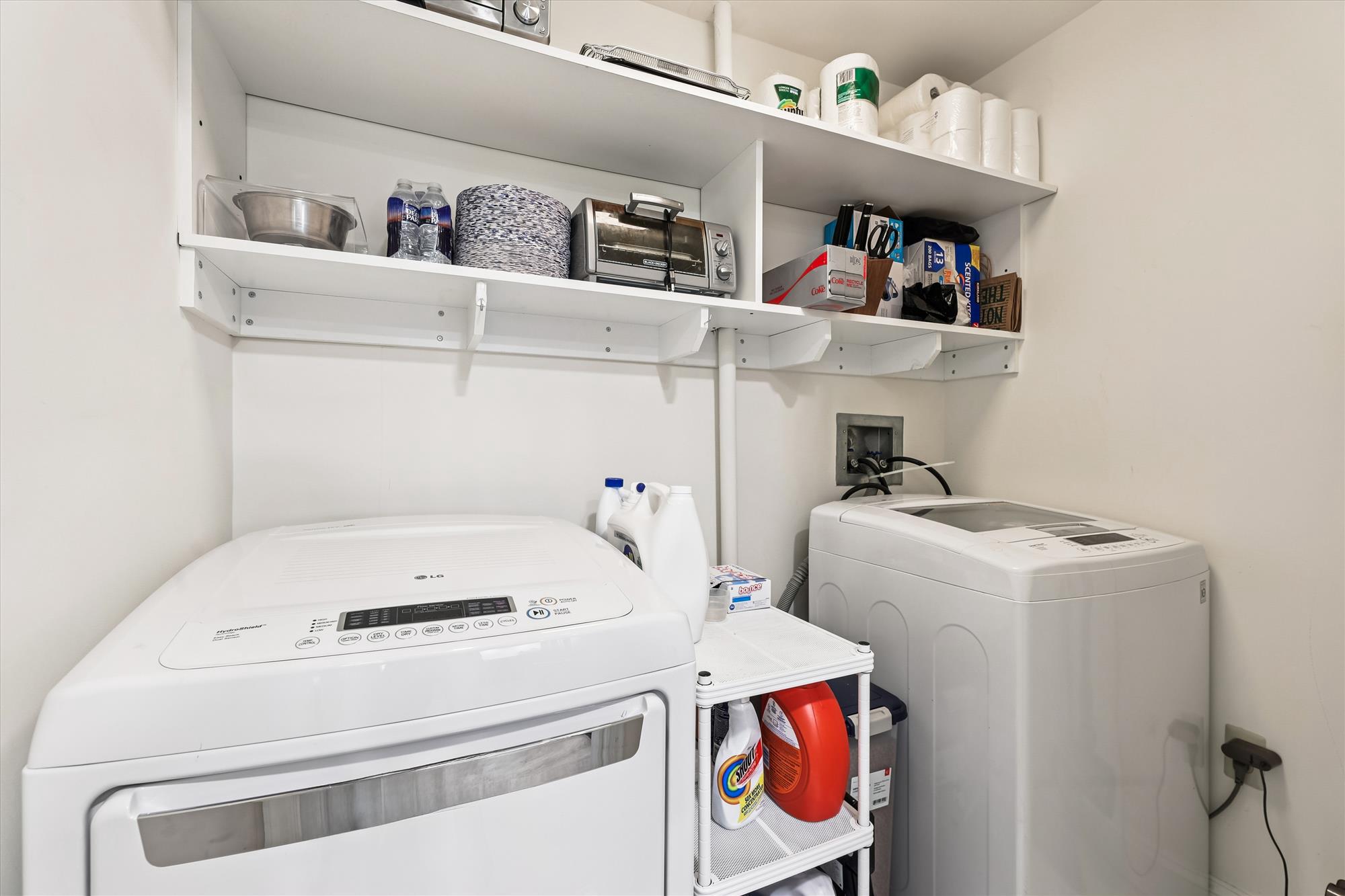 2501 Wisconsin Avenue Northwest, Unit 7 Washington, DC 20007 - Photo 29 of 30 Full size laundry room with storage.